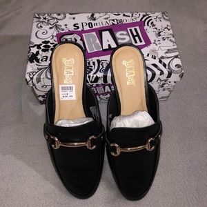 Diedra style black mules with gold detailing